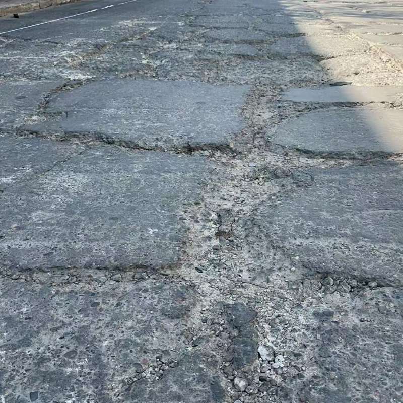 临颍路面起砂露石子修补料
